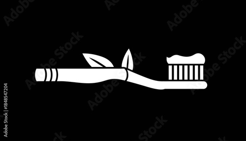 Eco-friendly bamboo toothbrush with toothpaste and leaves, symbolizing sustainable oral hygiene and natural care.