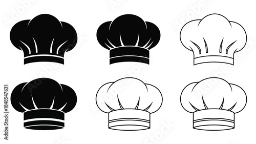 Various chef hats in black and white displayed in a simple arrangement