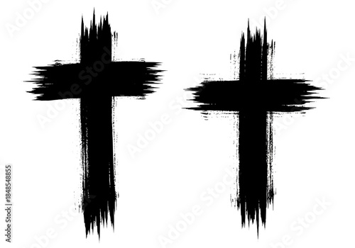 Two black grunge christian cross symbols painted with rough brush strokes