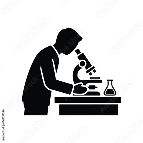 Scientist silhouette diligently using a microscope for detailed scientific analysis and research in a lab