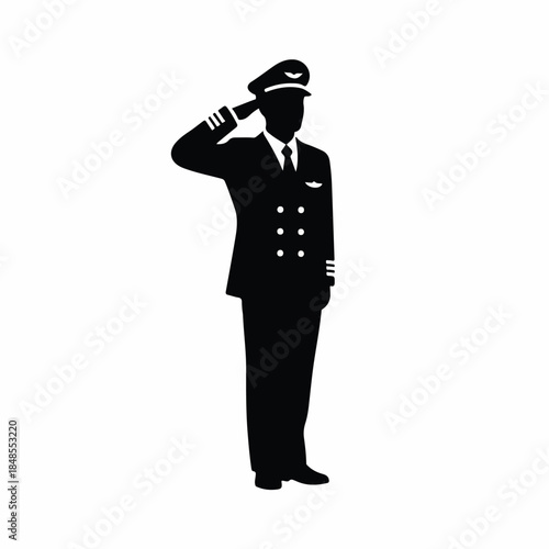 Pilot in uniform saluting with his hand on his hat, silhouette