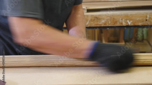Wood and wood-based materials industry. Carpenters working on wood factory with machines. Wooden furniture manufacturing process. Carpentry workshop location. working at furniture factory. 4 k video