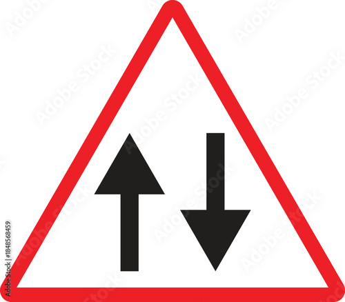 Red triangle warning sign indicating two-way traffic with an up and down arrow on a white background, commonly seen on roads.