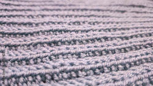 Knitting patterns and details for sweaters, hats, and other crocheted items.