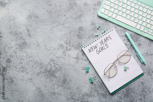Notebook with text NEW YEAR...