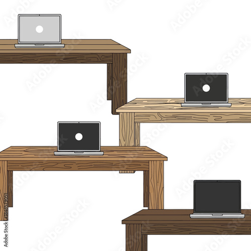 Multiple laptops arranged on wooden desks.