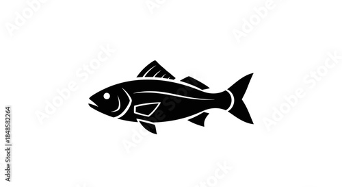 Black fish swimming alone sideways.