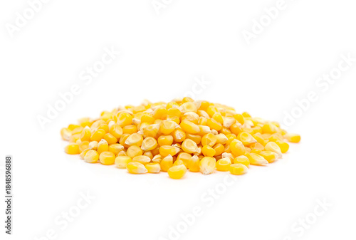Raw corn grains isolated on white background