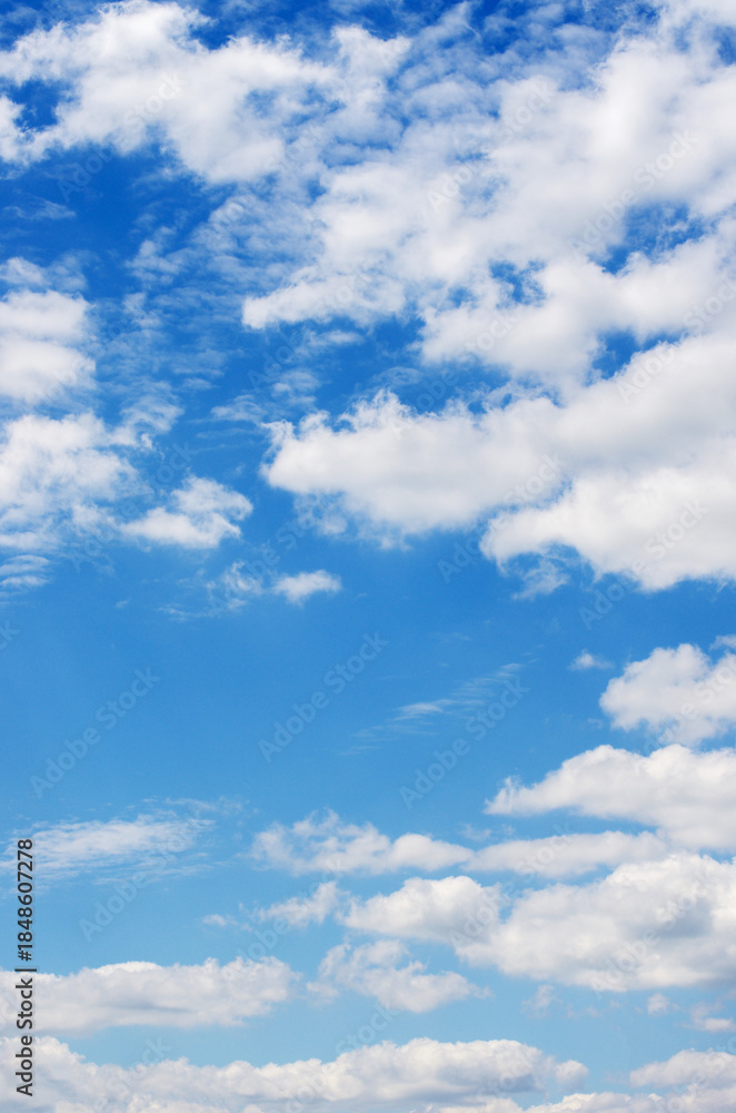 Naklejka premium White clouds in blue sky
