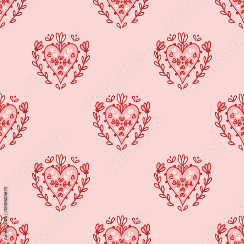 Seamless pattern with folk art or boho hearts decorated with flowers. Symbol of love. Scandinavian hand drawing background. Whimsical design