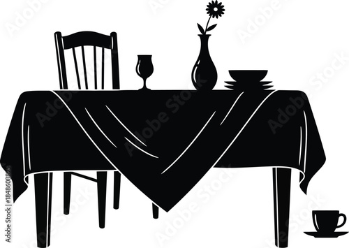A simple black and white illustration of a dining table setting