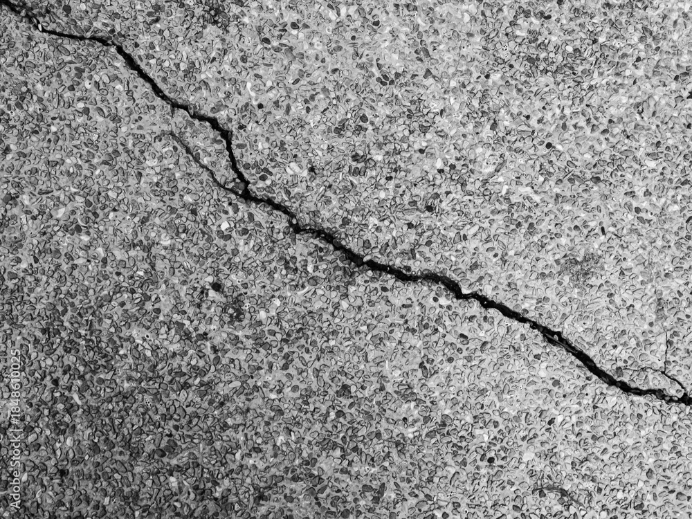 Obraz premium Crack wall texture background broken earthquake effect, whtie grey building cement damage pattern plaster grunge black line paint surface abstract, construction rough street concrete backdrop.
