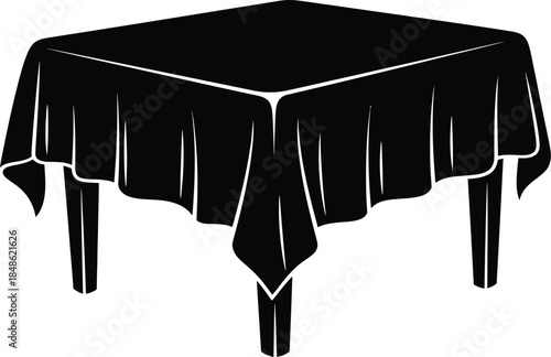 A black table with a draped cloth minimalist design stark contrast