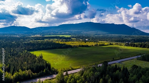 Aerial View of Green Fields and Mountains in Quebec, Canada