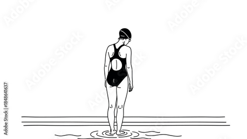 Minimalist swimmer in black swimsuit standing at water's edge