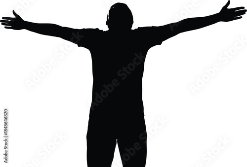 Silhouette of a man standing with arms wide open looking upwards in triumph against a stark white background symbolizing freedom and success