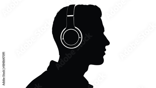 Silhouette profile of a young man wearing modern over ear headphones listening to music or audio content against a white background
