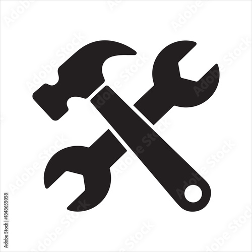 hammer and wrench crossed glyph icon representing repair and maintenance tools