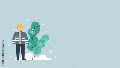 Professional worker in safety helmet and reflective uniform stands in a winter setting