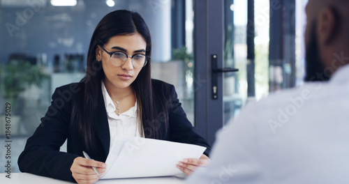 Fotografie Interview, reading and woman in office with paper, CV review or process for onboarding