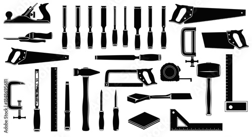 Assorted Carpentry Tools on White Background.