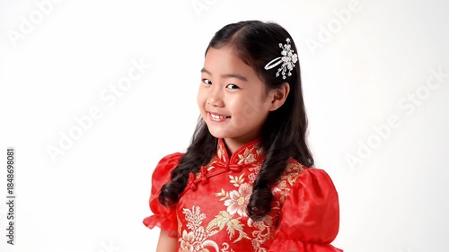 Joyful Young Asian Girl Wearing Red Traditional Cheongsam Dress with Golden Floral Embroidery and White Hair Flower
