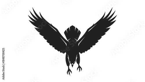 Striking black silhouette of an eagle soaring with wings spread wide in minimalist design