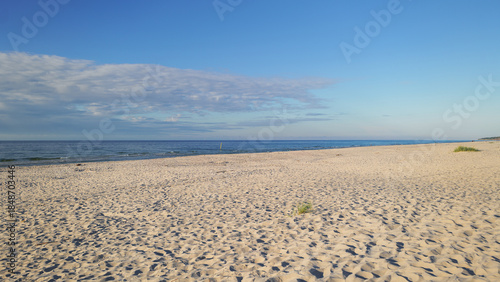 A beautiful, very wide beach on the Baltic Sea. Fine sand, sunny day. Gorgeous landscape. Slajszewo, Poland