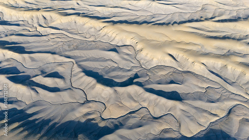 Lunar landscape. Drought and dry riverbeds. Aerial view of desert structures. Global warming and climate change. Universal use. General shots.