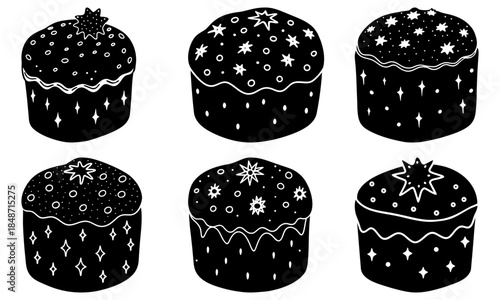 Five Black Cupcakes with White Star and Dot Decorations on White Background stars dots