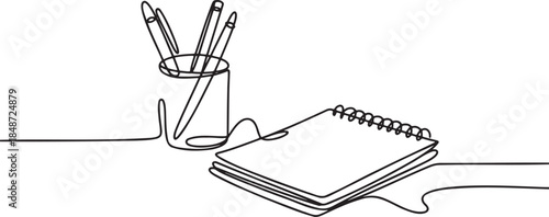 Desk set with notebook and pens single line art