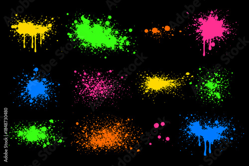 Colorful paint splashes on black background
