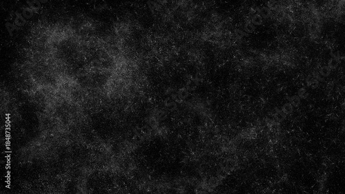 Black grunge texture overlay with fine white dust particles and noise

