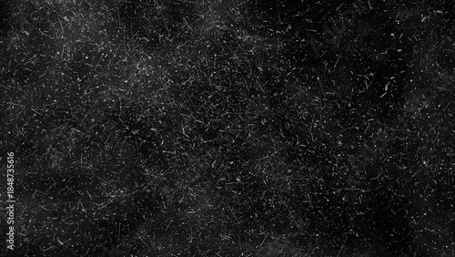 Black grunge texture overlay with high density fine white scratches
