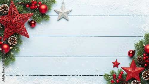 Festive Christmas border: fir branches, red ornaments, pine cones, snow, light blue wood background - Holiday design, winter card, banner, invitation, graphic element