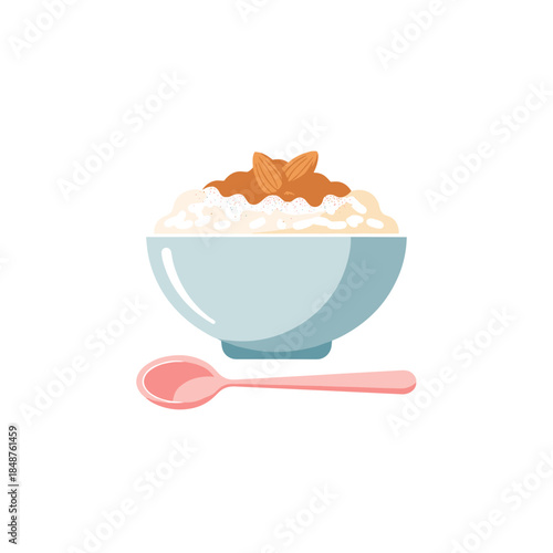 Rice pudding with almonds and cinnamon in a blue bowl  