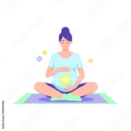 Pregnant woman sitting cross-legged on yoga mat with hands on belly  