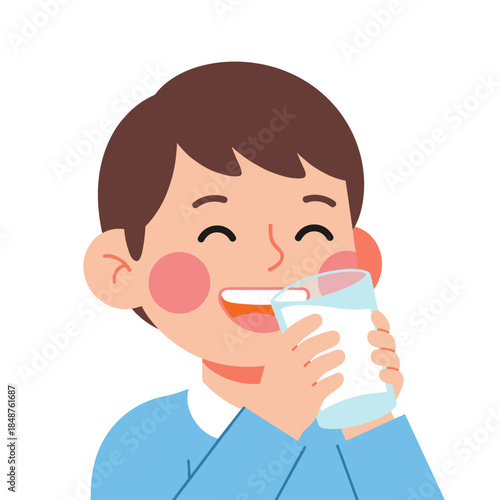 Young boy smiling while drinking milk from a glass indoors  