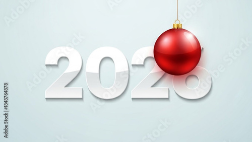 Shiny red Christmas ornament hanging on the number 2020 festive holiday greeting for New Year celebration