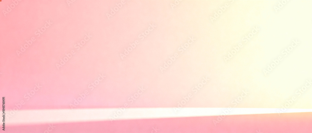 Obraz premium Ultra-wide 4:1 soft pastel pink background with a gentle gradient fading into a warm cream tone, subtle natural light shadow on the lower edge creating depth. Completely clean negative space, perfect 