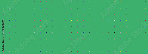 Vibrant abstract pattern with scattered colorful geometric shapes on a lush green background