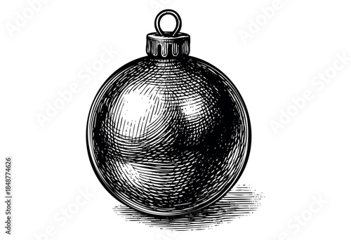 A detailed black and white illustration of a vintage Christmas ornament with a circular loop, rendered in a classic engraving style against a white background.