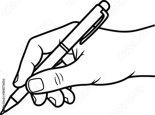 A hand holding a pen writing