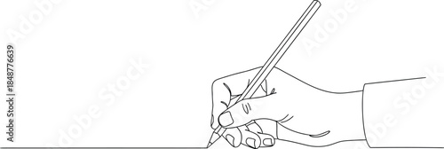 A hand holding a pencil and writing on a piece of paper