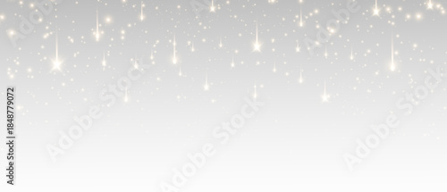 Glittering bokeh dust and twinkling star particles create a magical effect for overlays and backgrounds. A golden light effect in PNG format with transparent shimmer and glittering lens flares.