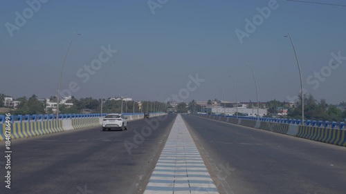 Diu, Gujarat, INDIA- 29th January 2025- Centre framed shot  showing Dr Shamji Bridge.Vehicles are moving from both sides.