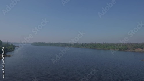 Diu, Gujarat, INDIA- 29th January 2025- Wide Angle shot of Tapi River flowing calmly through Diu and Daman.