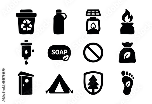 A collection of black silhouette icons representing outdoor adventure, camping, eco-friendly practices, and wilderness survival essentials on a white background — stock vector.