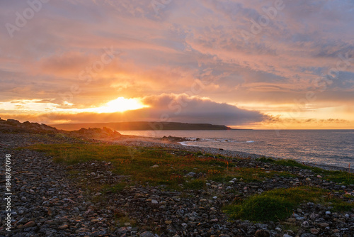 Russia, Murmansk region, Rybachy Peninsula. Sunset on the Barents Sea coast. August 2025
