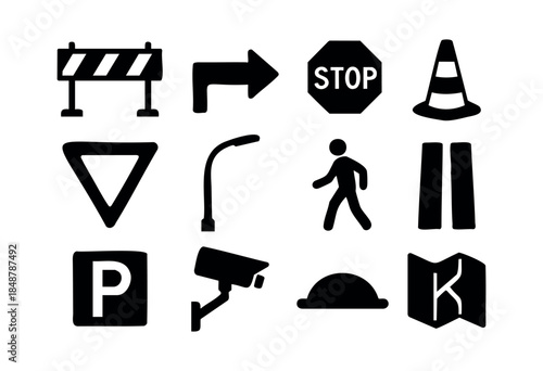 A collection of black silhouette icons representing various road signs, urban elements, and safety warnings on a white background — stock vector.